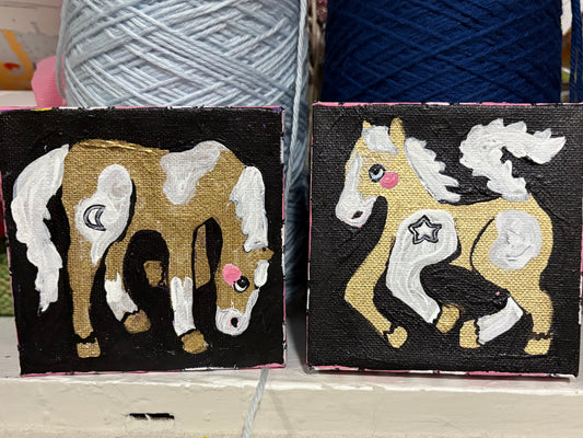 two tiny horses